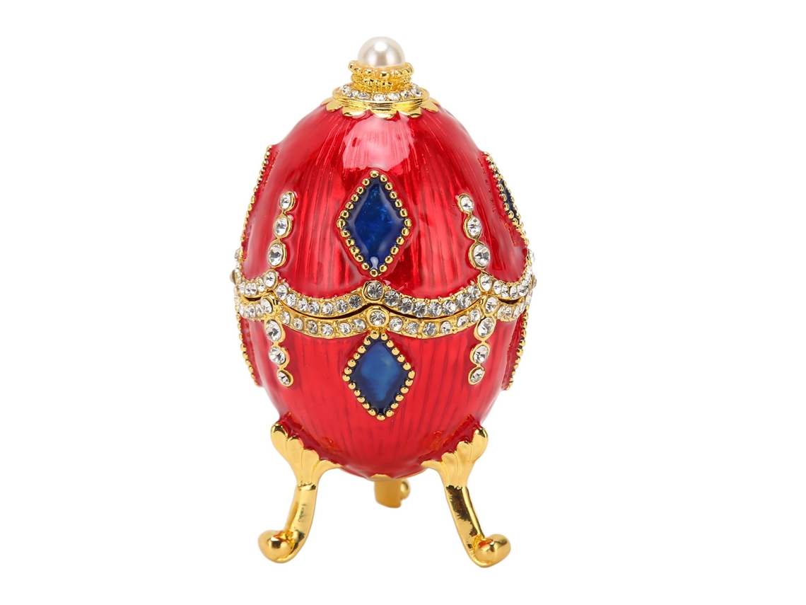 Cajas de joyería con forma de huevo y decoradas con pedrería.