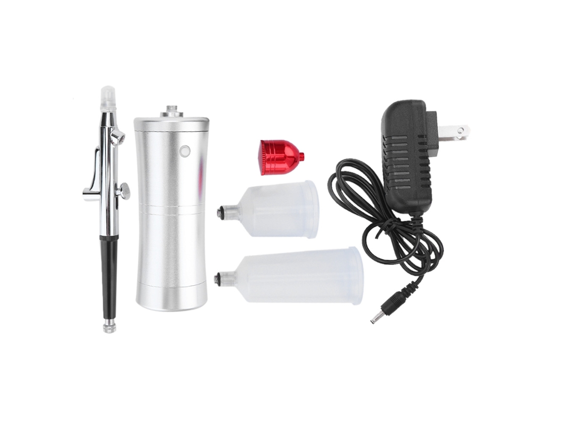 Pistola pulverizadora portátil con compresor, humidificación y oxígeno.