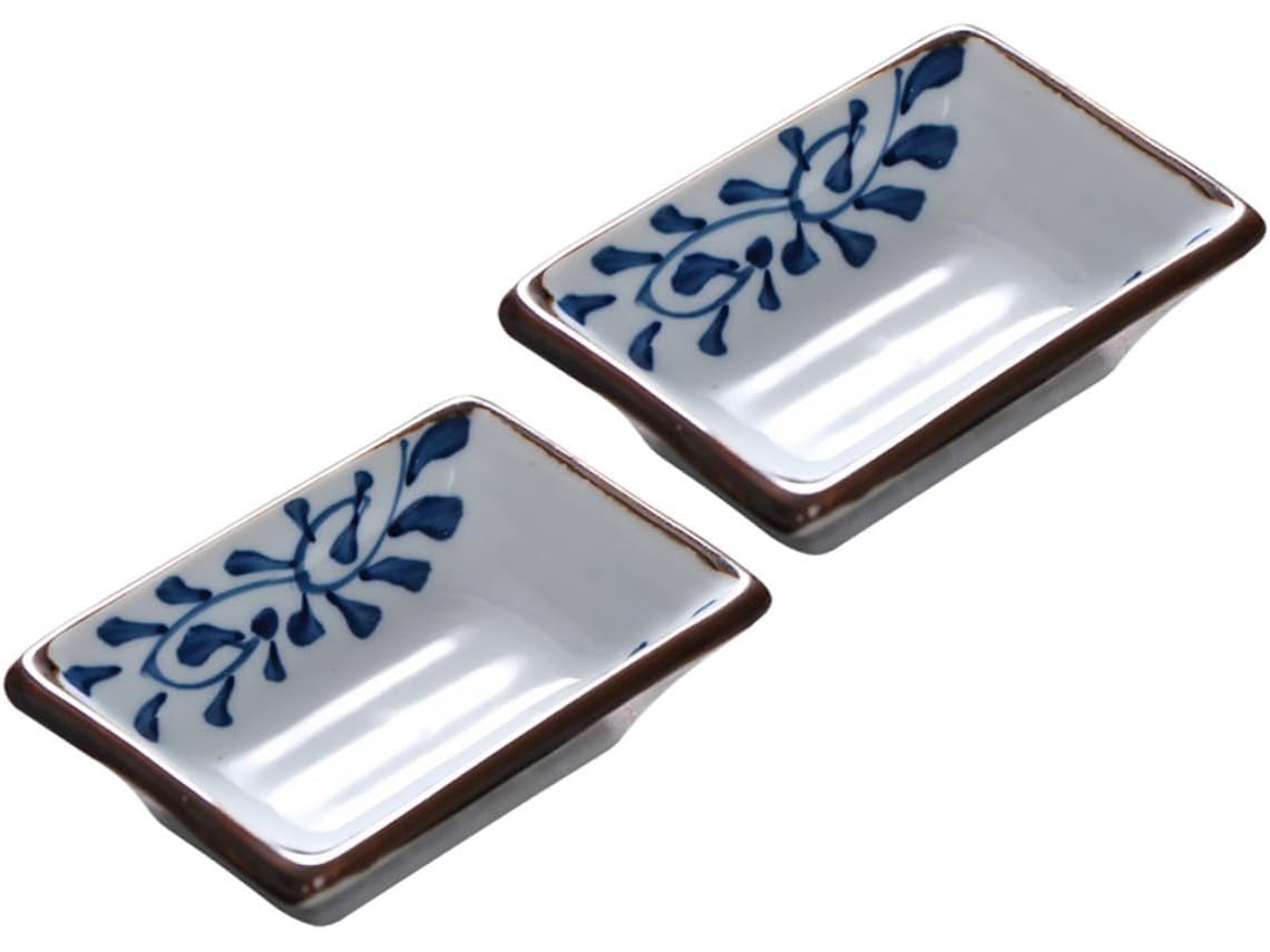 Dos platos rectangulares de cerámica para servir salsas y condimentos, con un creativo diseño japonés de Chaberlu.