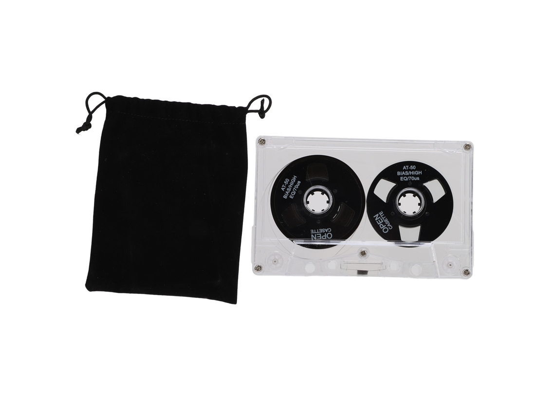 Cinta de casete blanca con carrete metálico para grabación de sonido y música.