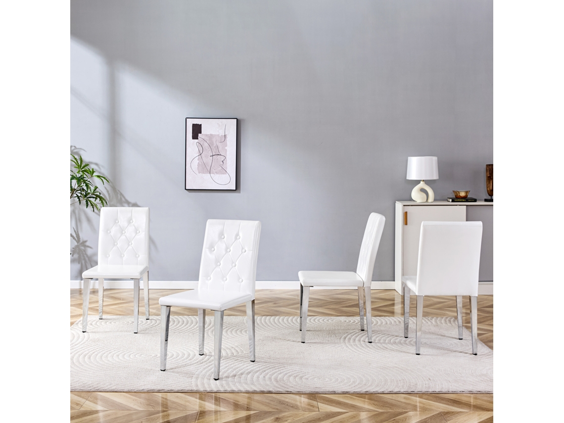 Juego De 4 Sillas De Comedor Blancas Con Detalles Y Patas Plateadas.