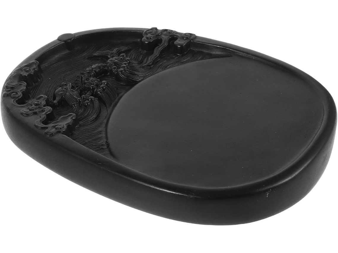 Tintero redondo negro para caligrafía y pintura, decorativo y práctico.