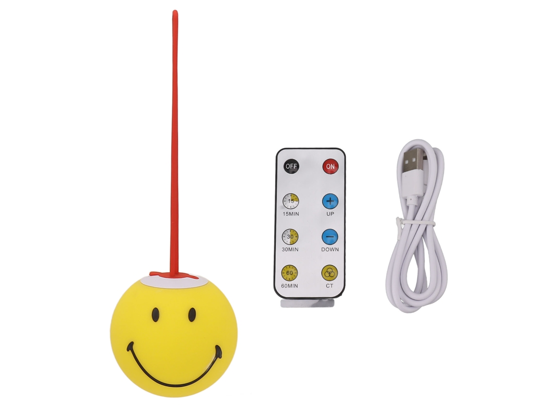 Lámpara amarilla con carita feliz y mando a distancia USB.