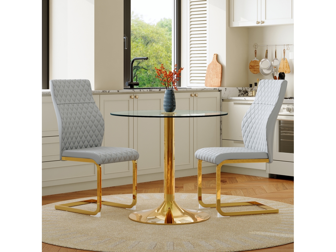 Mesa De Cristal De 85 Cm Con Acabado Dorado, 2 Sillas Gris Claro Con Acabado Dorado.