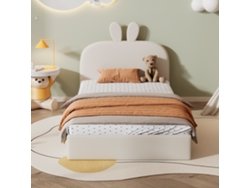 Cama infantil de 90 x 200 cm acolchada en terciopelo con cabecero en forma de conejo y somier de láminas en color beige.