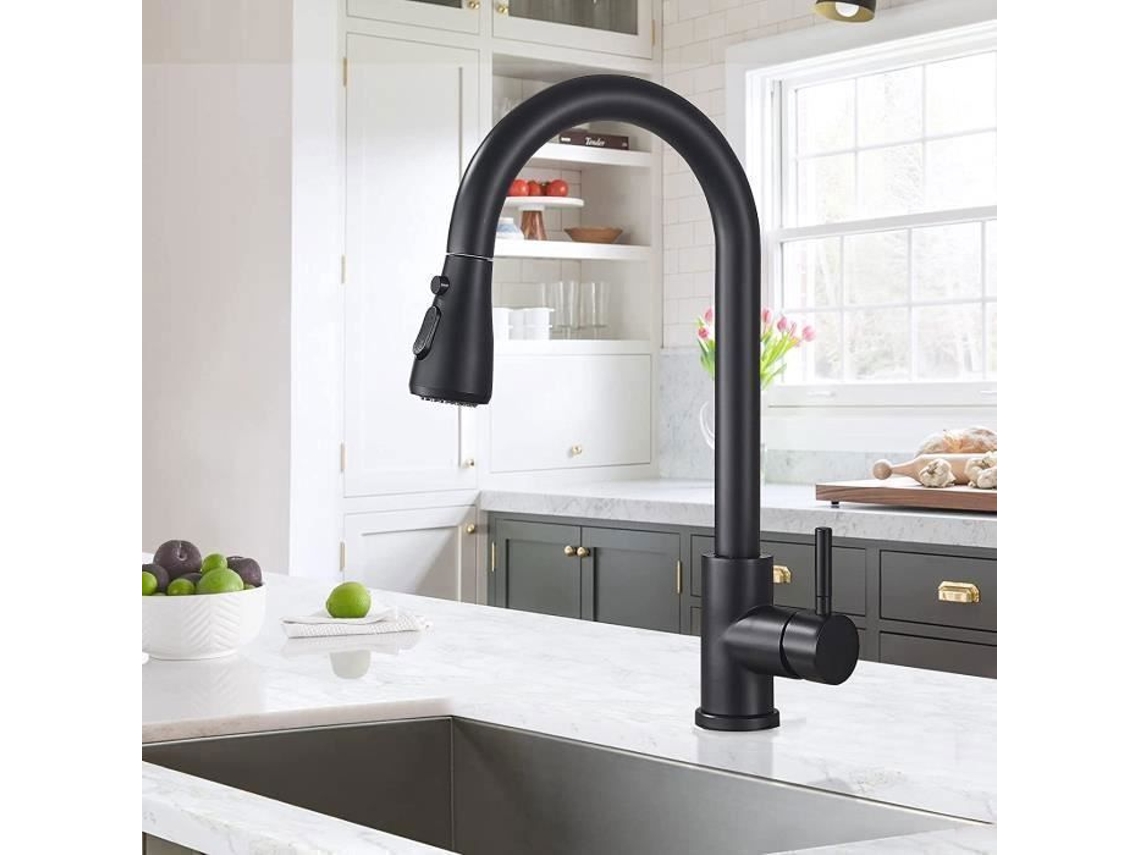 Grifo de cocina negro, con cabezal rociador extensible giratorio de 360° y una sola palanca para agua fría y caliente.