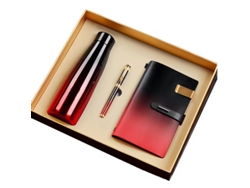 Set de regalo corporativo en degradado rojo/negro, para cumpleaños y clientes. Incluye termo, bolígrafo y libreta.