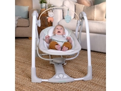 Columpio portátil para bebé Ingenuity Cozy Spot con arco de actividades y música.