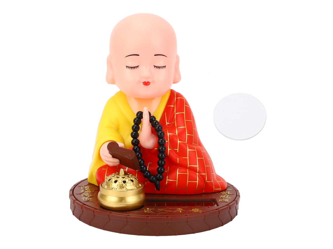 Figura pequeña de monje con nodo solar autoalimentado.
