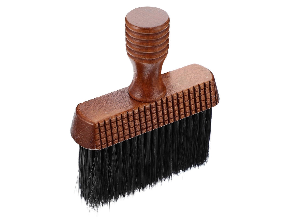 Cepillo de pelo roto con mango de madera negra para cortar el pelo.
