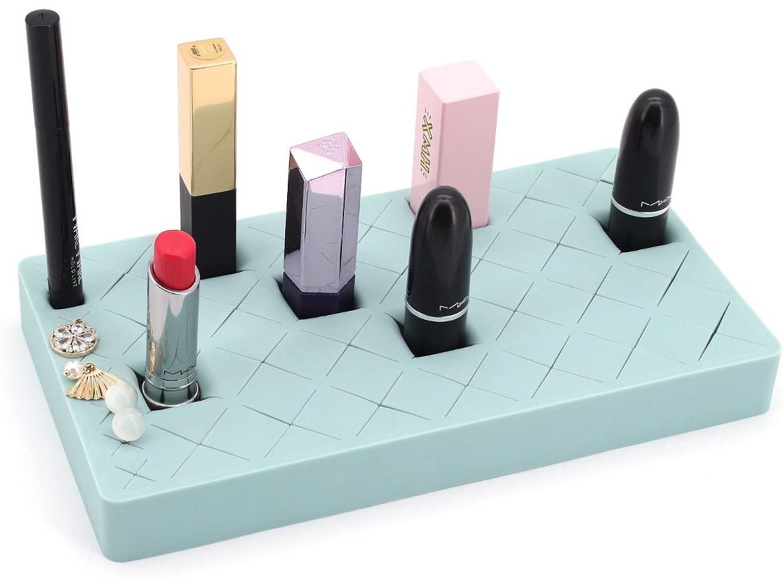Expositor de maquillaje con compartimentos ajustables, organizador de escritorio con material de silicona antideslizante para soluciones de maquillaje versátiles.