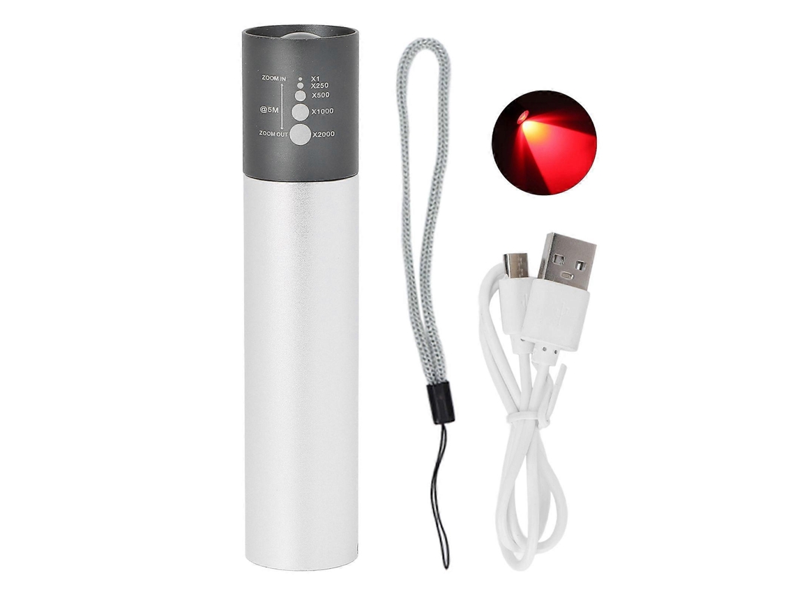 Linterna portátil con bombilla roja, fácil de usar. Dispositivo con bombilla roja.