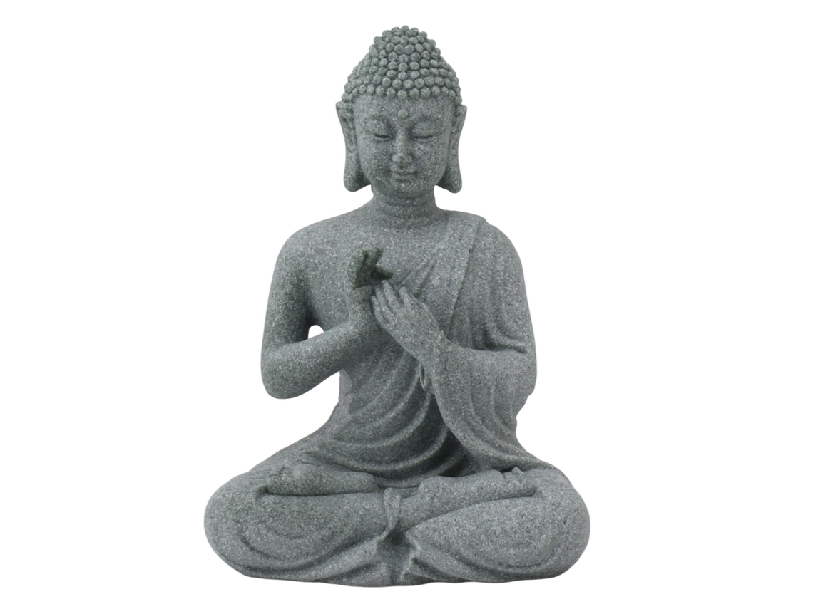 Estatua de Buda sentado en arena verde | Sin marcar