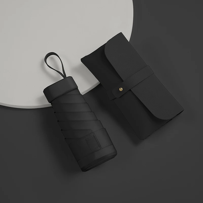 Mini paraguas cápsula MDUG, doble función, protección contra la lluvia y el sol (negro)
