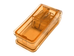 Cortador de tabletas con cuchillas de acero inoxidable y protector para tabletas de vitaminas marrones grandes y pequeñas.