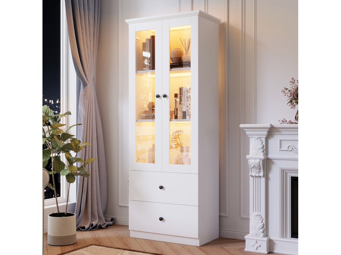 Vitrina vertical en color blanco mate con iluminación LED, mando a distancia de 16 colores, 2 cajones y estantes regulables, ideal para el salón.