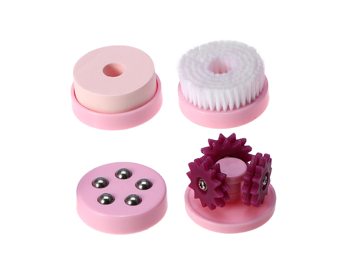 Limpiador facial eléctrico USB 4 en 1 con cabezales intercambiables para el cuidado facial. Color rosa.