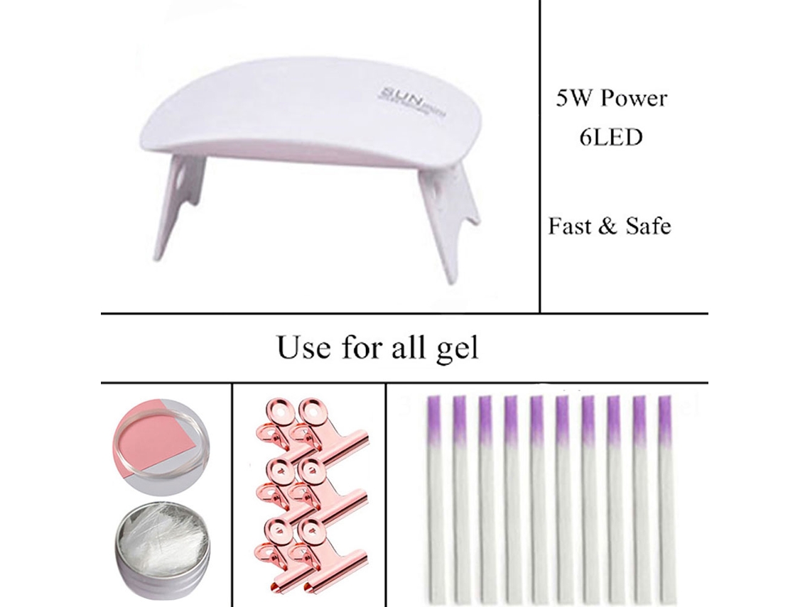 Kit de extensión de uñas con lámpara UV, pegamento, moldes de fibra y piedras decorativas para manicura.