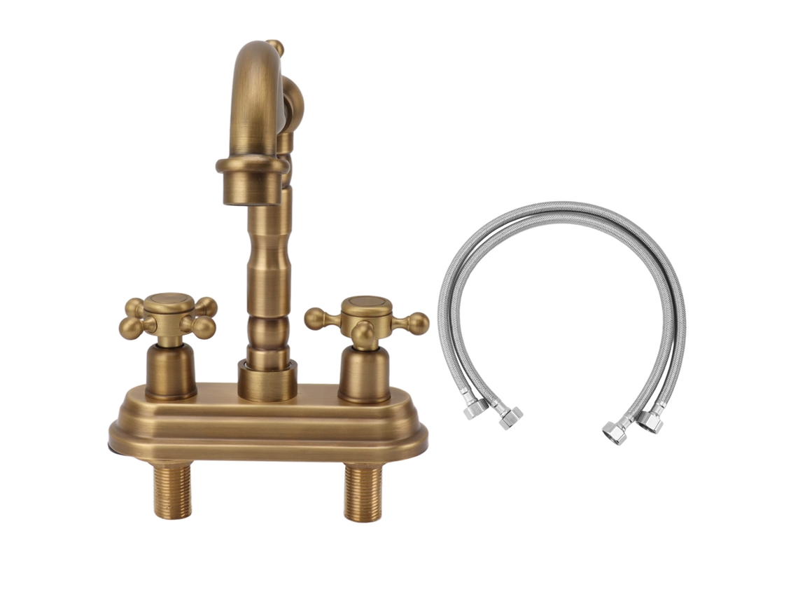 Grifo de lavabo antiguo con control de agua fría y caliente