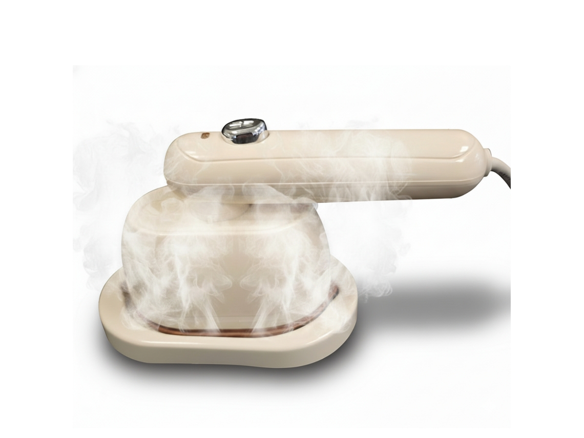 Plancha de vapor portátil Starlyf Magic Iron, calentamiento rápido, depósito de 100 ml, doble función (seco/húmedo), compacta, ideal para viajes y uso doméstico.