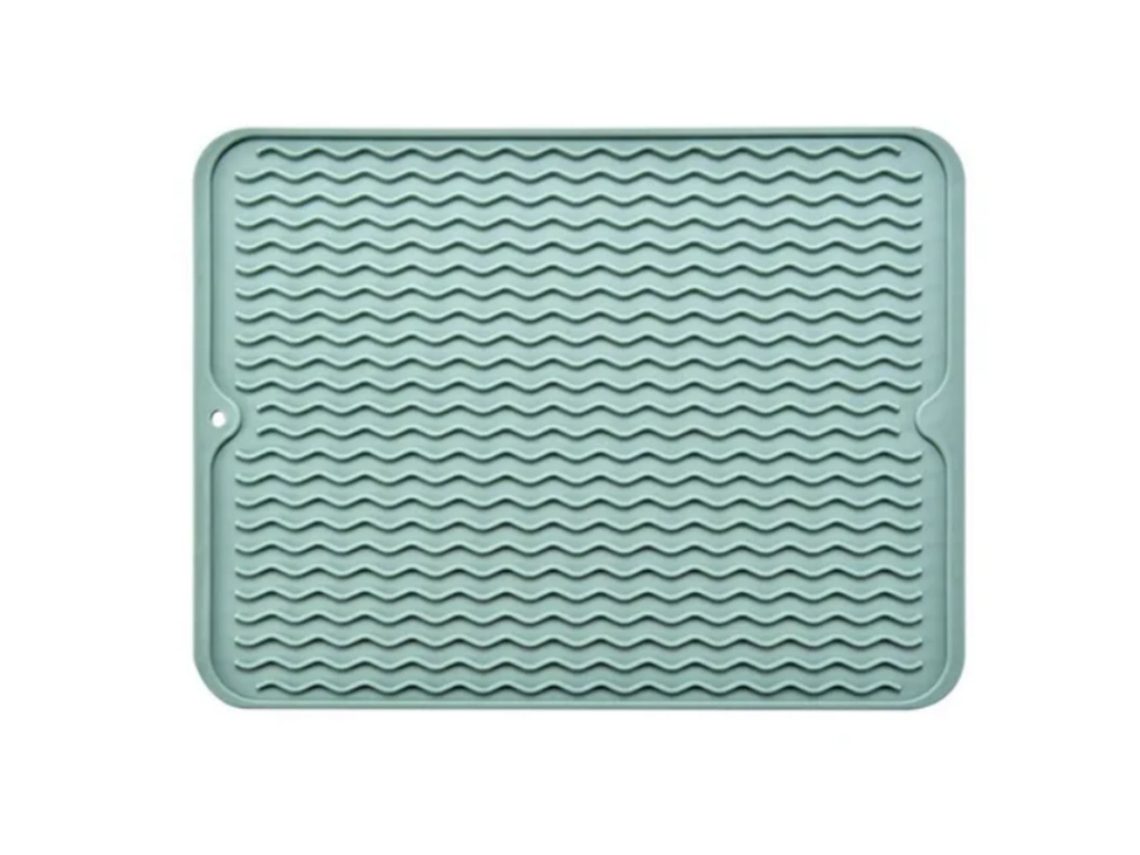 Alfombrilla de goma aislante antiadherente para cocina, color verde.