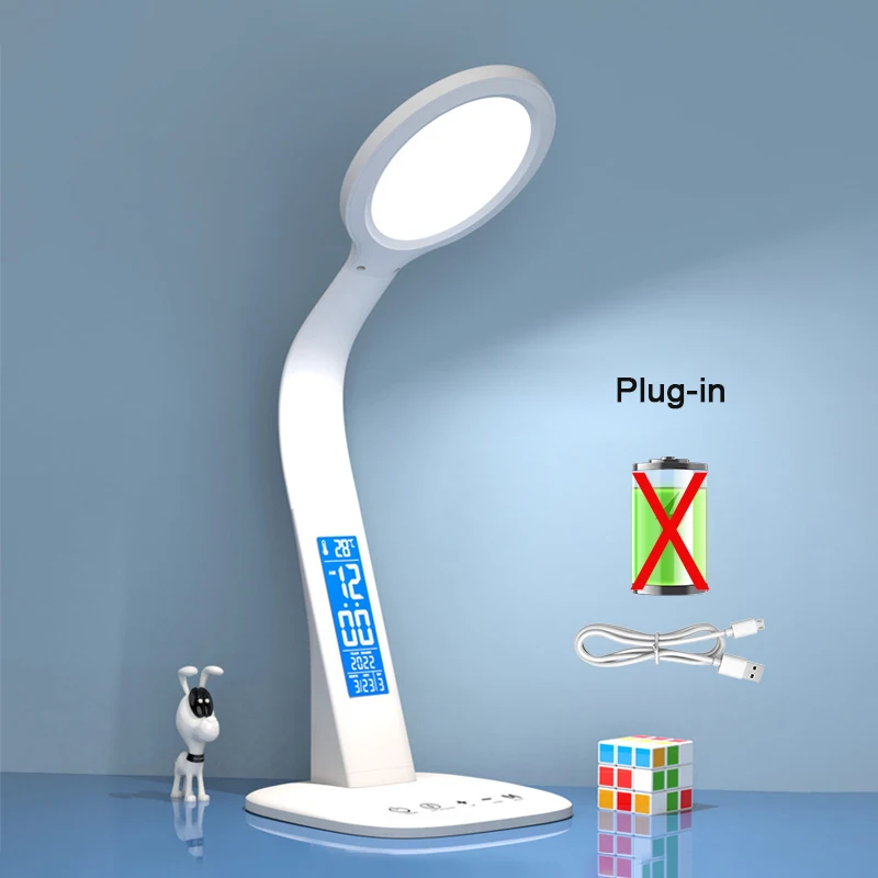 Lámpara de Mesa LED con Reloj (enchufable), Recargable vía USB, con Intensidad Regulable, Plegable y Suave para la Vista.