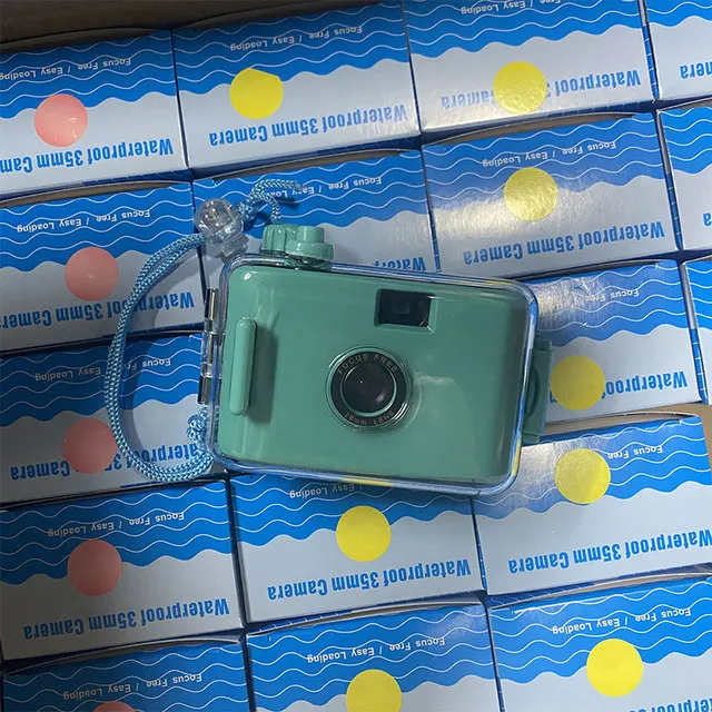 (cian) Cámara analógica, cámara compacta, apta para película de 35 mm.