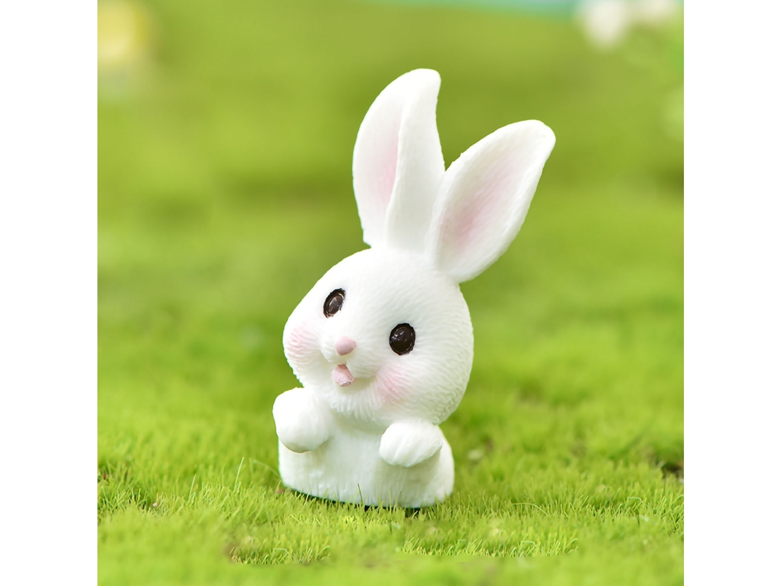 Figura decorativa de resina de un precioso conejo inodoro