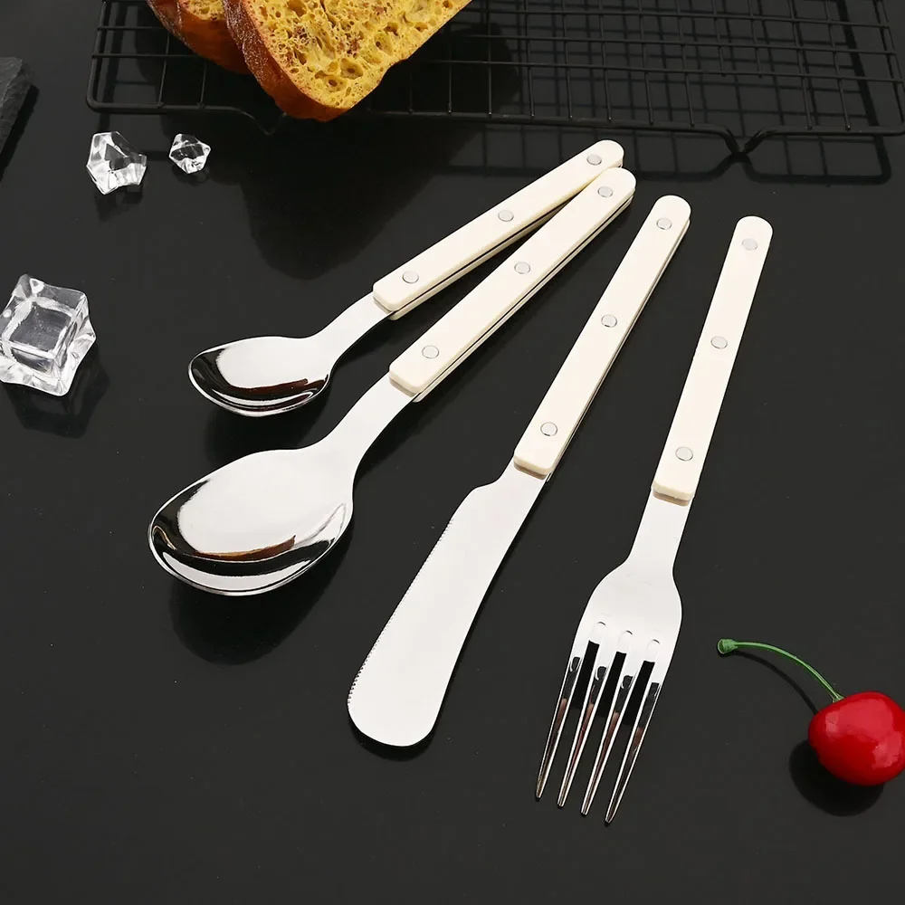 Vajilla de acero inoxidable (beige, juego de 4 piezas) con mango acrílico, incluye cuchillo, tenedor y cuchara, para uso doméstico en la cocina.