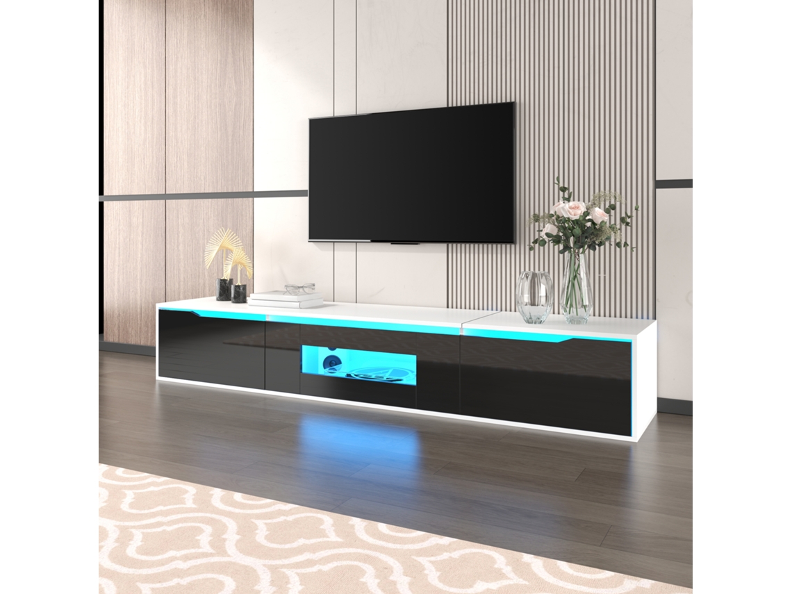 Mueble para TV con acabado brillante, en colores que combinan con el blanco y negro, con iluminación LED que cambia de color.