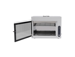 Esterilizador de herramientas para uñas, tecnología UV, diseño compacto, color blanco roto.