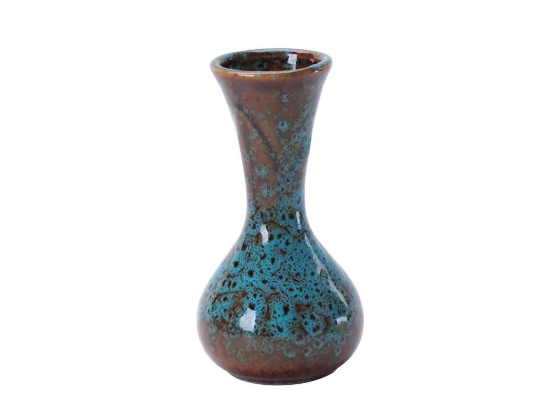 Azul. Altura: 10,8 cm. Diámetro: 5,7 cm. Diámetro interior: 3,4 cm.