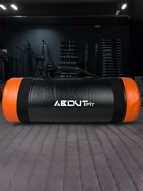 Bolsa de entrenamiento funcional Aboutfit de 20 kg, tejido resistente y asas ergonómicas.