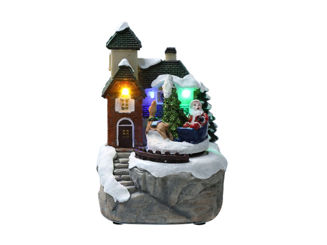 Decoración navideña: Cabaña con luces, música y nieve.